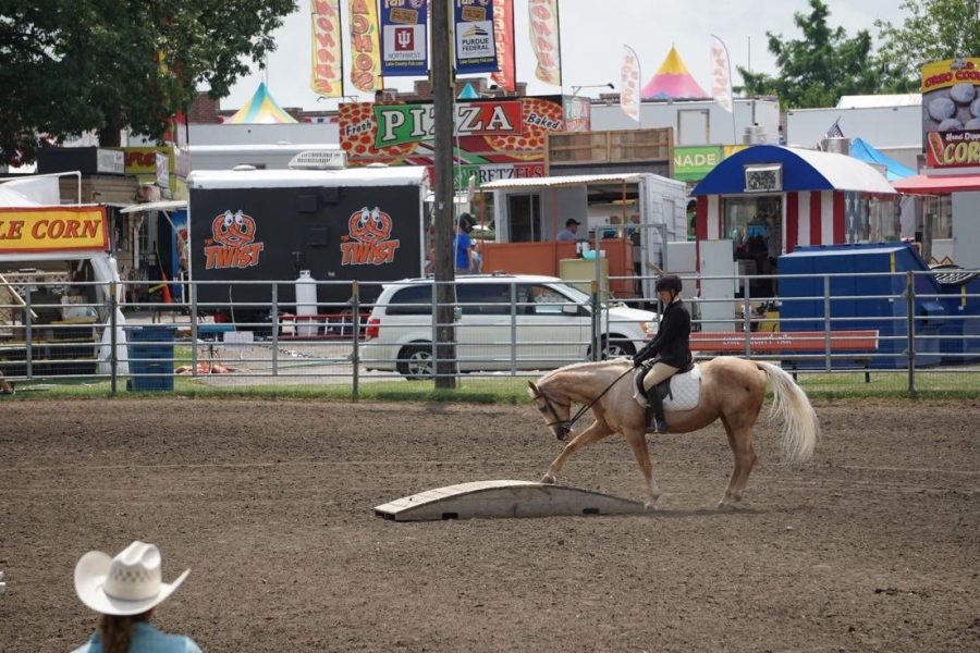 Senior Sammy West practicing with her horse