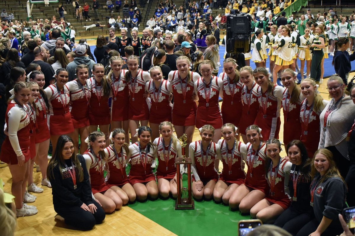 Crown Point JV, Varsity, and coaches pose with their state runner-up trophy.