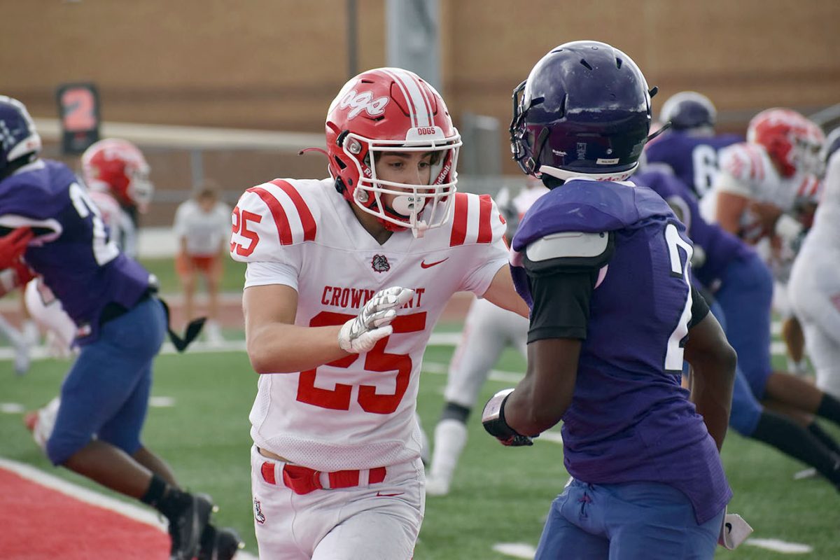 Carson Cavalcante (10) defends the play.