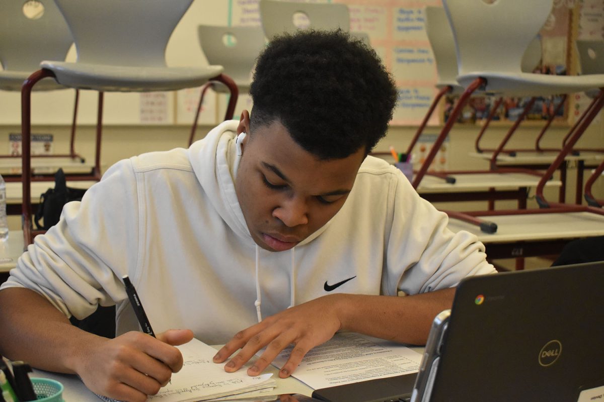 Junior Devion Outten prepares for a mock debate scrimmage.