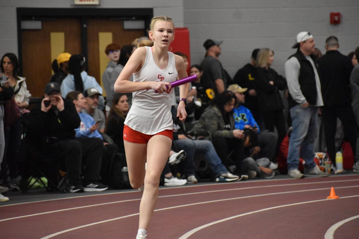 Everly Pycraft (10) runs the anchor leg for the 4x800 meter relay.