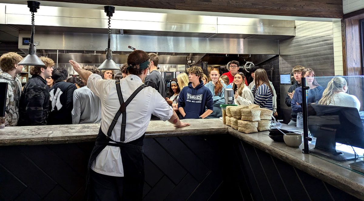 The classes learn the steps of making empanadas while being able to socialize and have lunch with peers. 