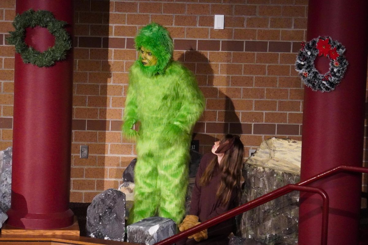 Jett James (9) is starring as the grinch for the concert.   