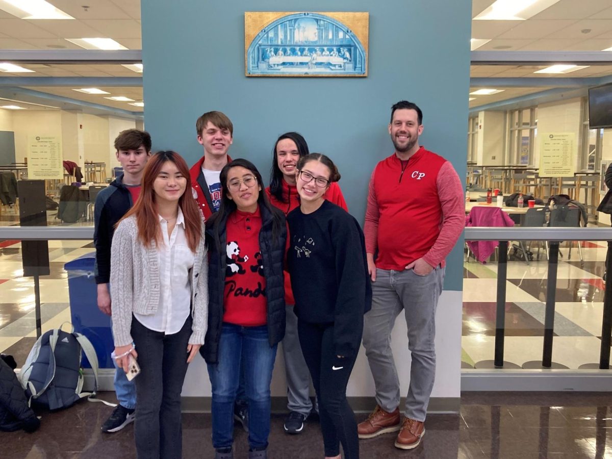 Mr. Smith and the Quiz Bowl team at one of their competitions.