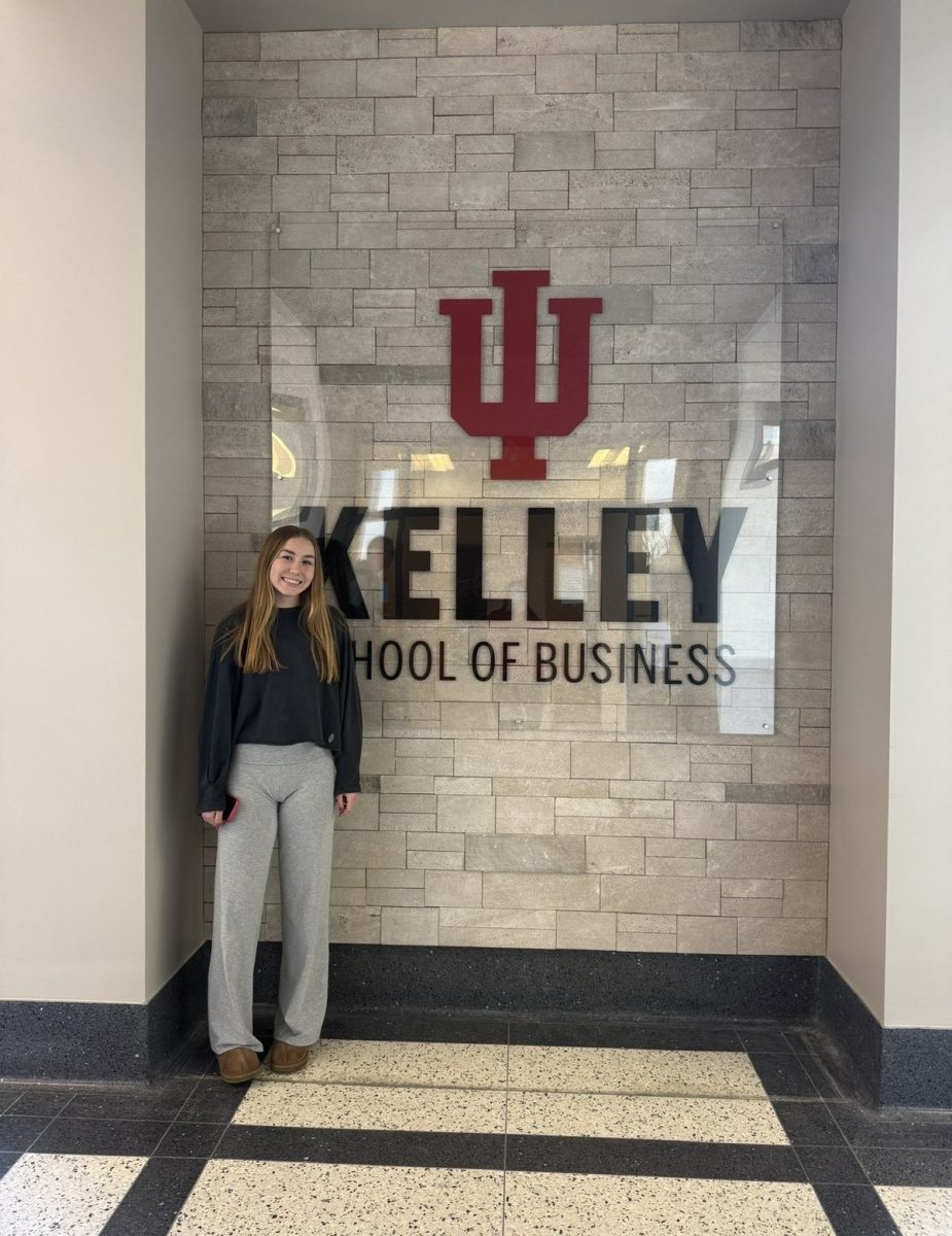 Senior Nora Sargent poses in front of prospective college at IU