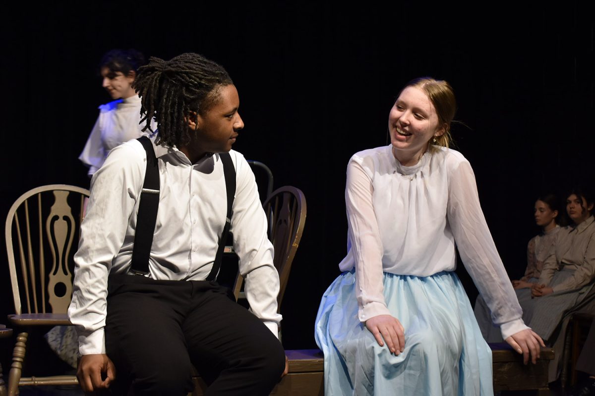 Rico Ardister (11) and Samantha Murzyn (9) talk about how their day at school went. 